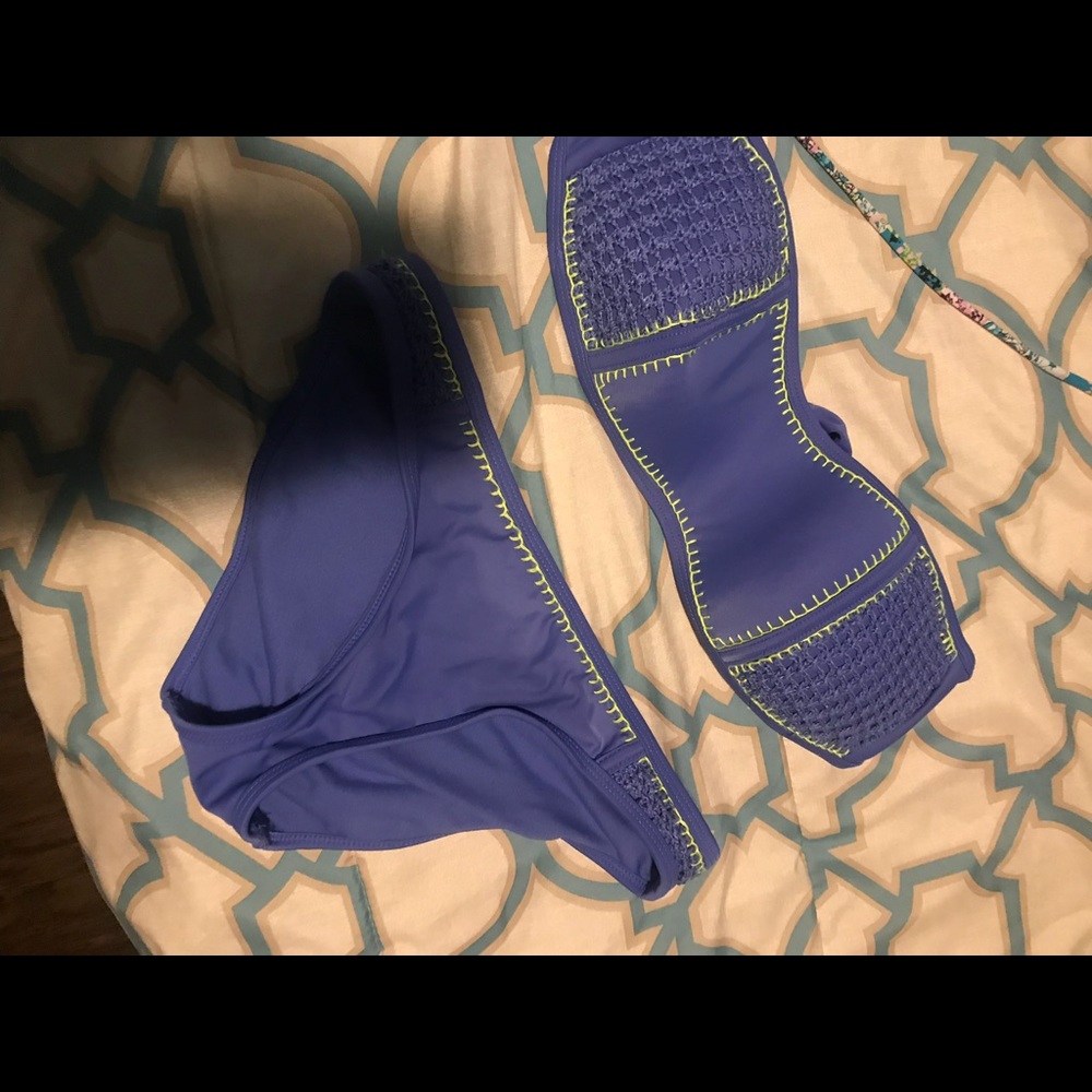 Swim top blue is m bottom is small other is small